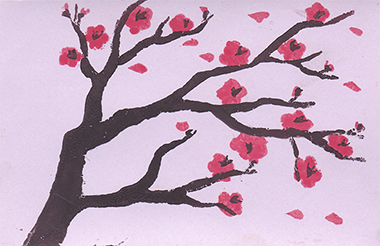 Carte rose imprimée d'une linogravure bicolore rouge et noire, représentant une branche de cerisier en fleur.